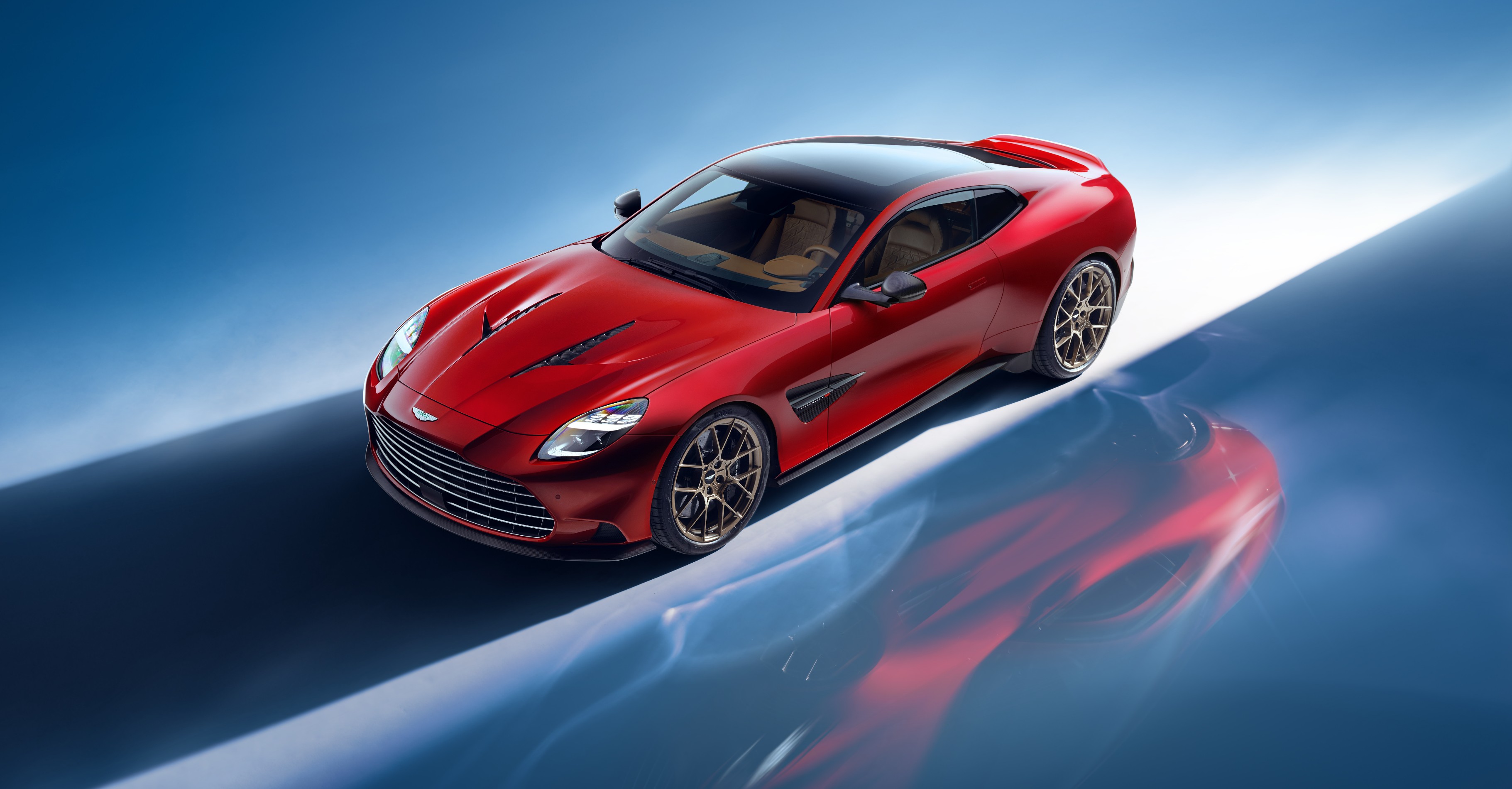 The new Aston Martin Vanquish breaks cover. The V12 powerplant stays on The new Aston Martin Vanquish breaks cover. The V12 powerplant stays on
